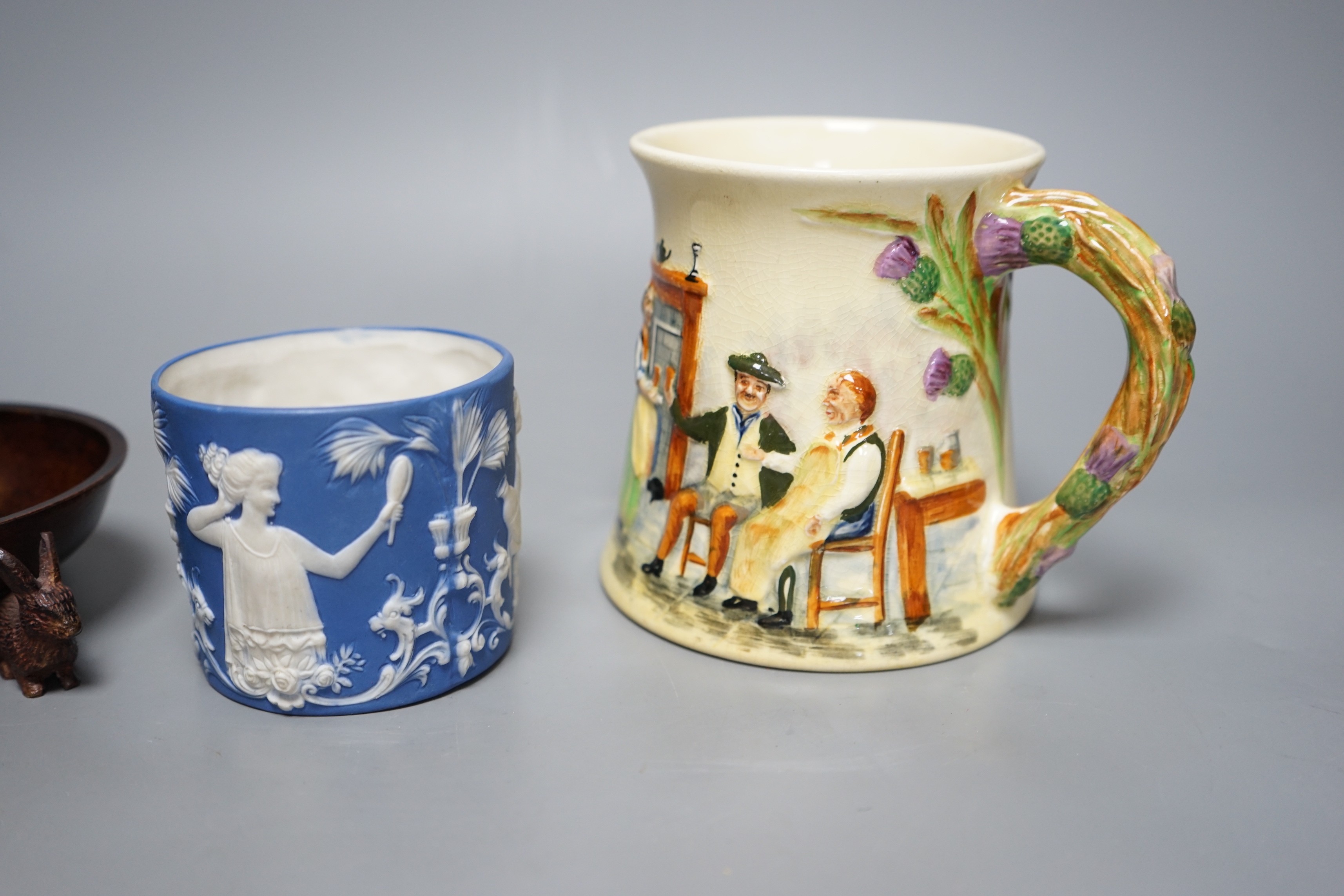 A Crown Devon Fieldings musical mug, a bronze tripod dish and a jasper pot
